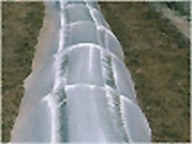 Low tunnels, low tunnel greenhouse, low tunnel films greenhouse manufacturer, supplier & exporter, Climax, Gujarat, India - Image