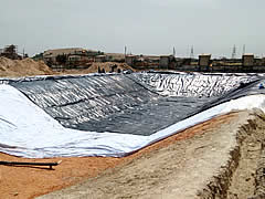 Solar evaporation pond used to reduce seepage losses, soil pollutions, water pollutions, hdpe geomembrane liners protect soil & ground water beneath, Climax,India - Image